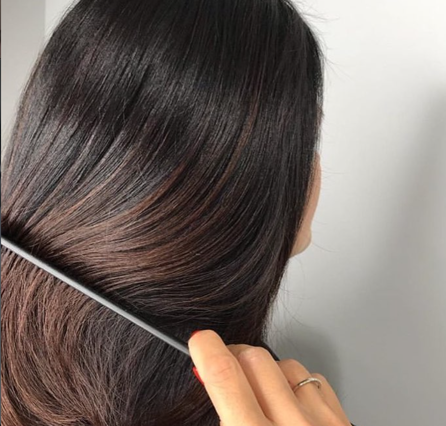 High-gloss espresso brunette, color by Carla at Good Beauty Chicago