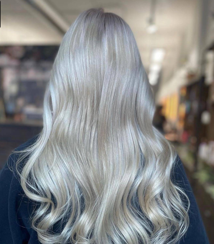 Liquid silver-blonde waves, color by Carla at Good Beauty Chicago