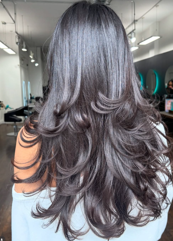 Long glossy brunette layers, color by Christina at Good Beauty Chicago
